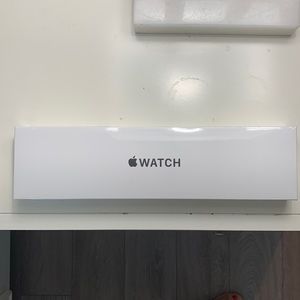 Apple Watch, SE 40mm silver aluminum white sport band. Never opened.
